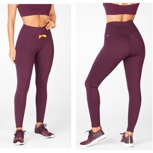 Fabletics High-Waisted Motion Paneled Legging Burgundy Plum size S